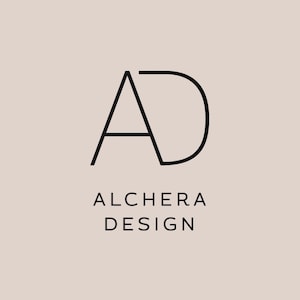 May include: A black and white logo with the letters "AD" in a stylized font. The text "ALCHERA DESIGN" is below the logo.