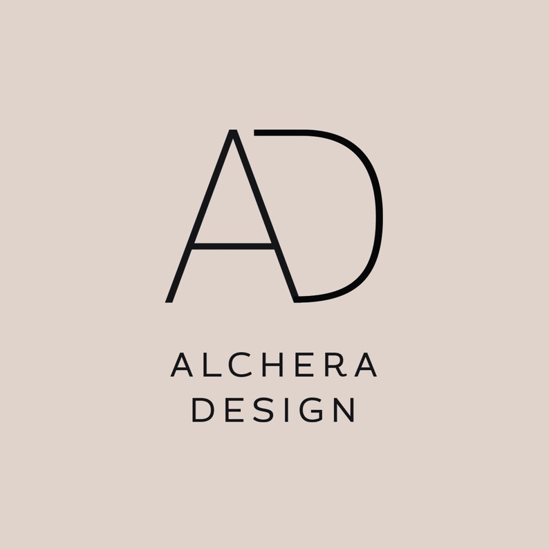 May include: A black and white logo with the letters "AD" in a stylized font. The text "ALCHERA DESIGN" is below the logo.