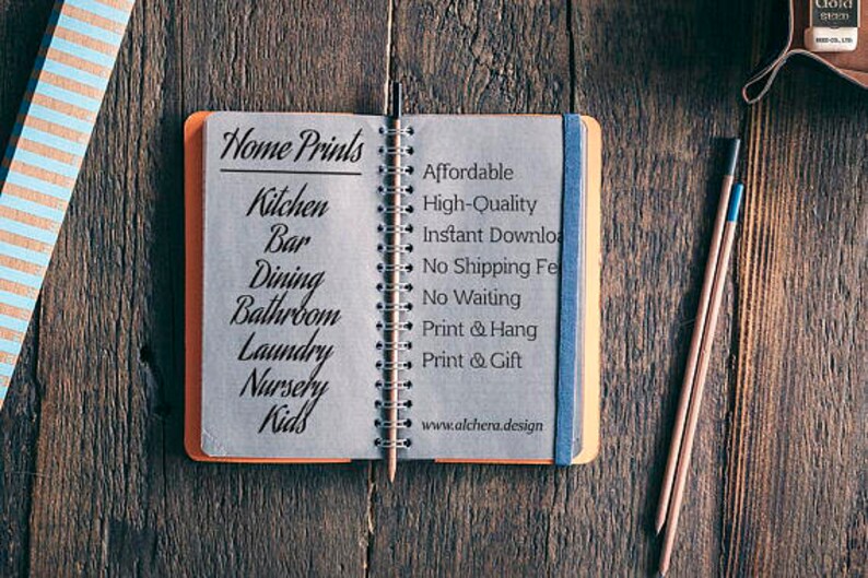 May include: An open notebook with the words "Home Prints" and a list of rooms, including "Kitchen," "Bar," and "Dining." The notebook is on a wooden surface, with pencils and a decorative strip nearby. The text also includes "Affordable" and "High-Quality."