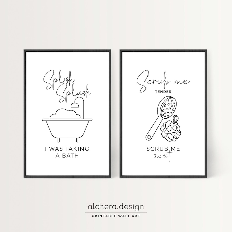 Two framed black and white line art prints: one of a bathtub with "Splish Splash I was taking a bath" and one of a loofah with "Scrub me tender scrub me sweet."
