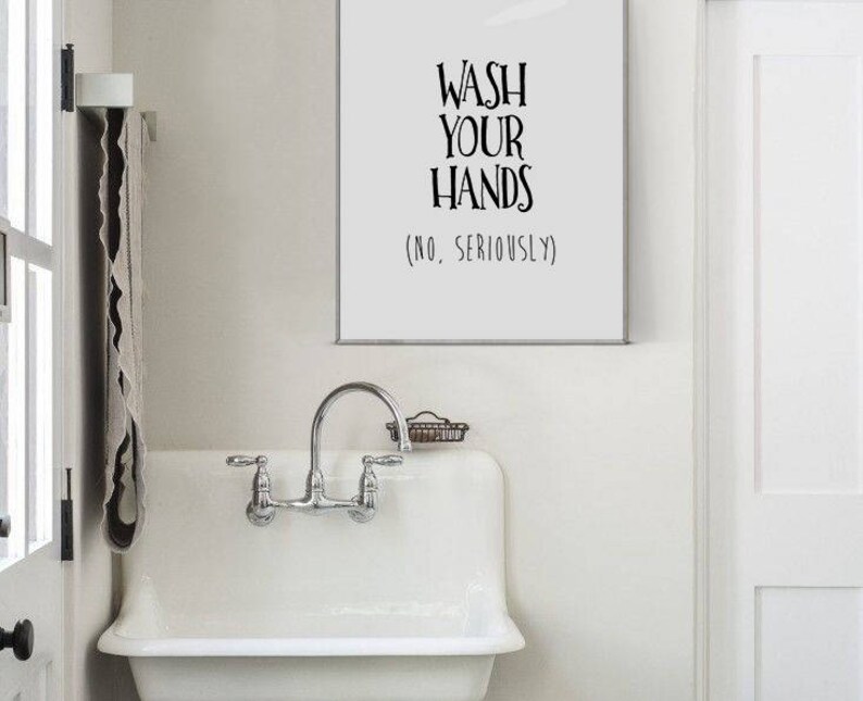 May include: White bathroom sink with a chrome faucet and a sign that reads "Wash Your Hands (No, Seriously)"
