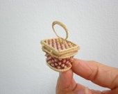 mini baskets made from rattan and bamboo.they made as same really size with color, material and process. but they are mini item and beatiful