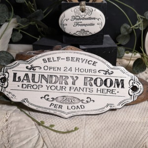 Enamelled terracotta plaque &quot;LAUNDRY ROOM&quot;.