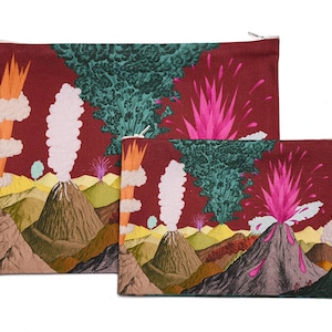 May include: Two fabric pouches with a red background and a colourful volcano design. The pouches feature pink, green, and orange accents.