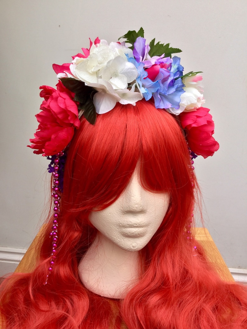 Headband with brightly coloured artificial flowers and strands of beads Inspired by Frida Kahlo.