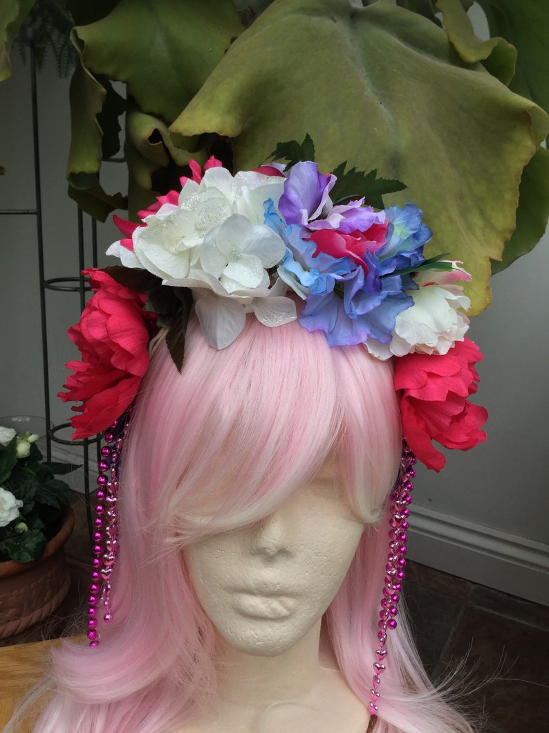 Headband with brightly coloured artificial flowers and strands of beads Inspired by Frida Kahlo.