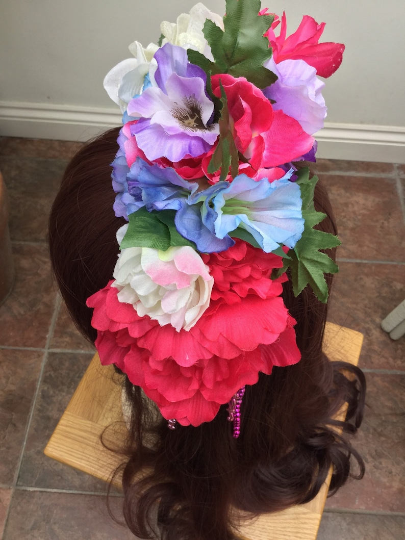 Headband with brightly coloured artificial flowers and strands of beads Inspired by Frida Kahlo.
