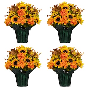 May include: Four arrangements of sunflowers and orange chrysanthemums in dark green pots. The sunflowers have dark brown centers and bright yellow petals. The chrysanthemums are a vibrant orange. The arrangements are set against a white background.