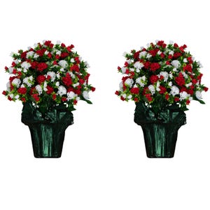 May include: Two artificial flower arrangements in green pots. Each arrangement features red and white carnations with green foliage.