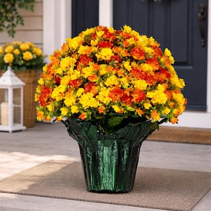 Artificial Orange and Yellow Garden Mums Flower Arrangement in a Green Weighted Flower Pot for Outside Home Decor