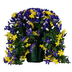 May include: A vibrant floral arrangement featuring a mix of yellow and purple flowers, set in a dark green pot. The flowers cascade downwards, creating a full, lush appearance. The arrangement is set against a white background.