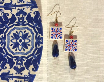 Brand's iconic majolica, coral pendant earrings and painted Sicilian ceramics