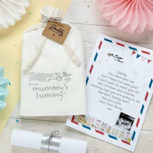to daddy from the bump, a cute daddy poem from the bump, surprise dad to be with a gift from the bump