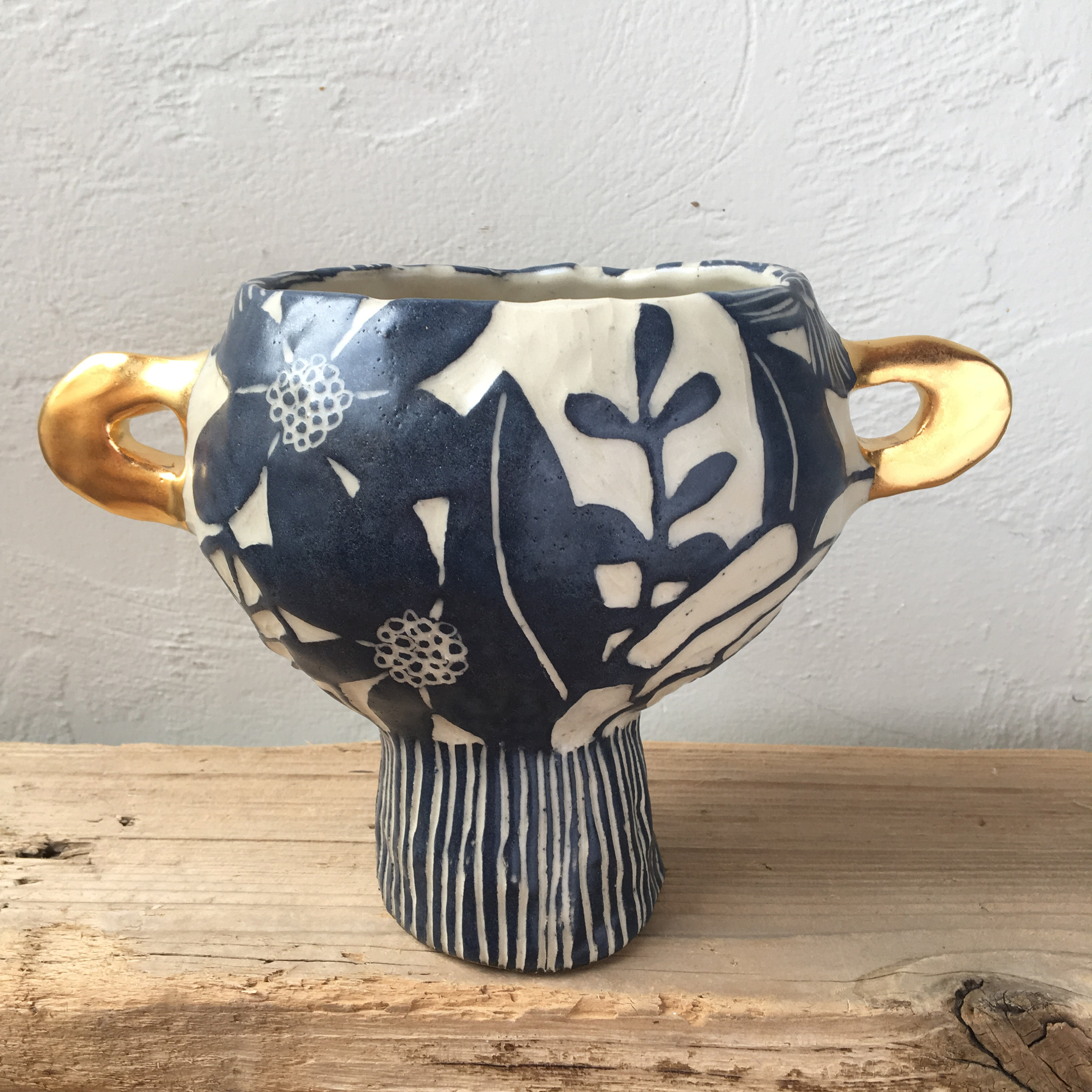 pedestal floral vase