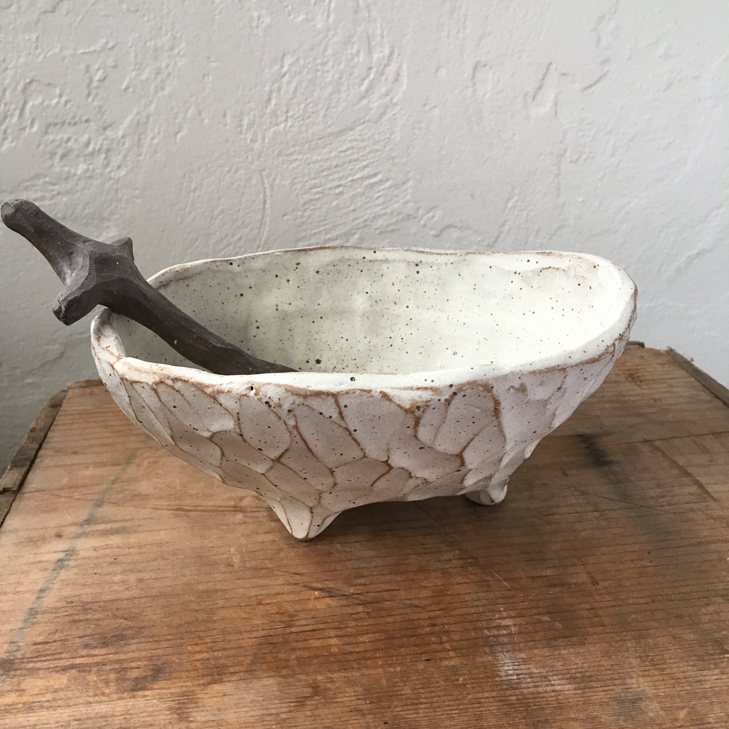 footed serving bowl with spoon