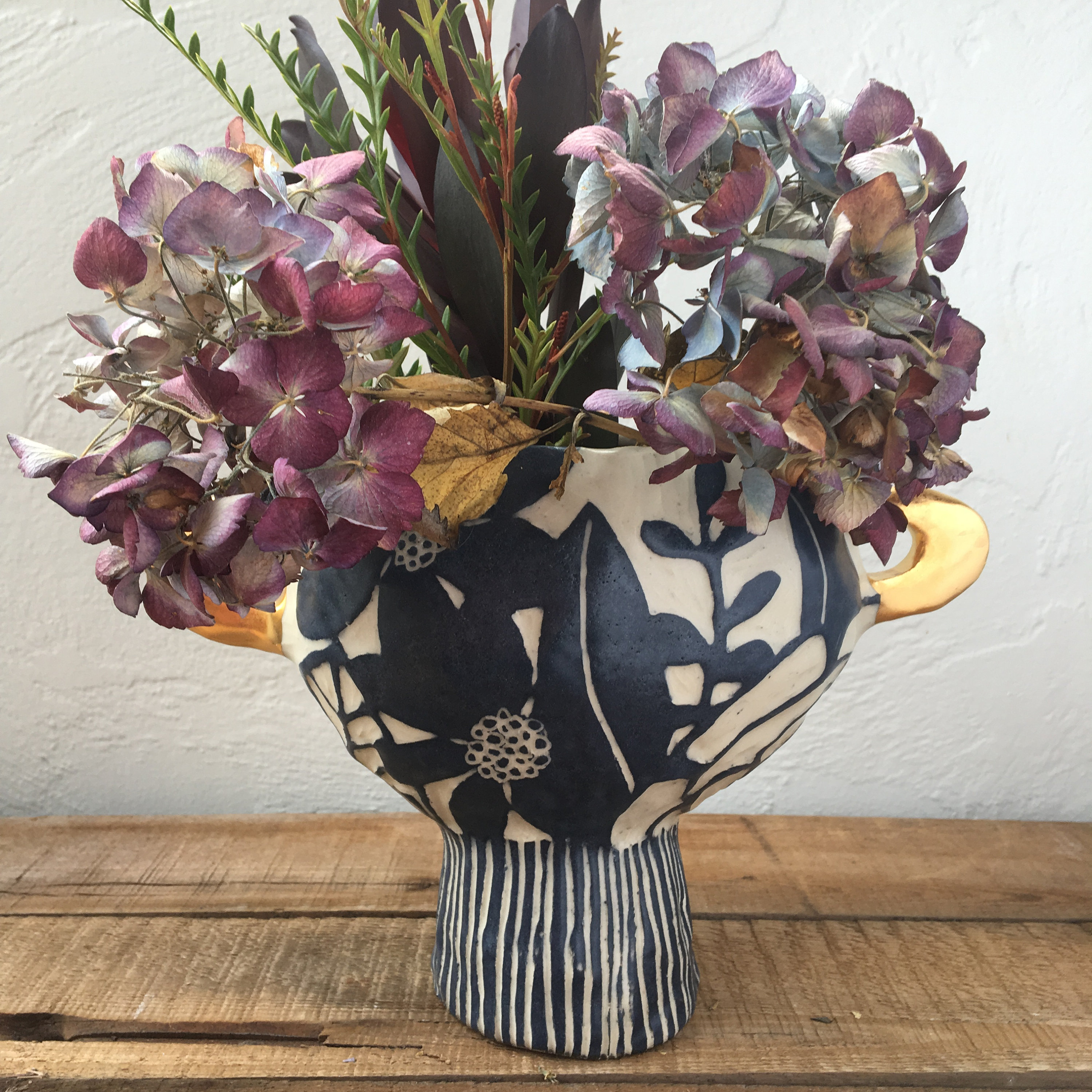 pedestal floral vase