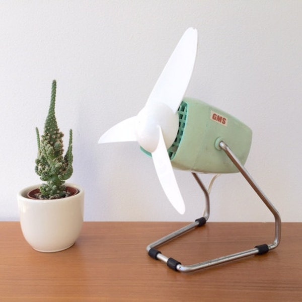vintage fifties kitchenware: GMS mint green table ventilator desk fan plane shaped three winged