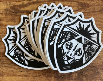 Sticker ARTINTHEMACHINE Shield Linocut