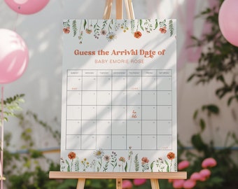 May include: A floral-themed baby shower game with a calendar for guests to guess the arrival date of Baby Emorie Rose. The due date is circled on the calendar.