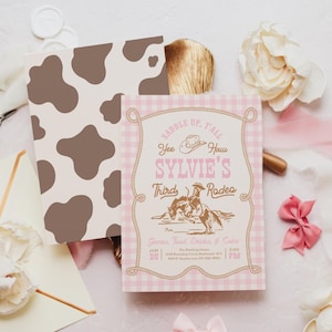 May include: A rectangular invitation card with a light pink gingham border and a rope frame design. The text reads: SADDLE UP, Y'ALL, Yee Haw, SYLVIE'S Third Rodeo, Games, Food, Drinks & Cake, JAN 25, 2:00 PM. It features a brown cowboy illustration.