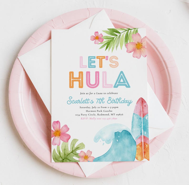 May include: A birthday invitation with the words "LET'S HULA" in colorful letters. The invitation features watercolor illustrations of a wave, a surfboard, and tropical flowers. The invitation is on a pink plate.