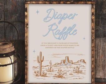 Op de afbeelding: Een bord met een blauw touwontwerp waarop 'Diaper Raffle' staat. Het bord heeft ook een woestijnlandschap met cactussen en bergen op de achtergrond. De tekst onder het touwontwerp luidt: 'Als je een pak luiers hebt meegebracht, pak dan een kaartje en schrijf je naam op om mee te doen aan de luierloterij.'