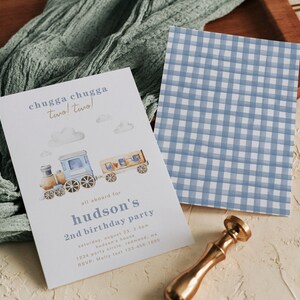 May include: A blue and brown train with white clouds and the text "chugga chugga two! two!"  All aboard for Hudson's 2nd birthday party. The invitation includes the date, time, location, and RSVP information.