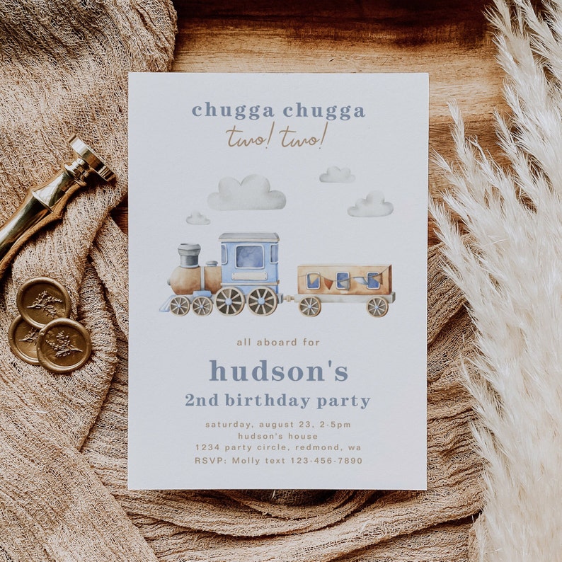 May include: A blue and brown train with a white cloud background. The invitation reads "chugga chugga two! two!" and "all aboard for hudson's 2nd birthday party". The invitation includes the date, time, location, and RSVP information.