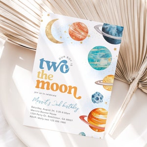 May include: A blue and yellow invitation with the text "Our boy is two the moon" and a watercolour illustration of planets and stars. The invitation is for a second birthday party and includes the date, time, location, and RSVP information.