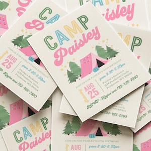 May include: A stack of rectangular birthday party invitations featuring the text Camp Paisley in green and pink. The design includes a pink tent, green pine trees, and yellow stars. The text provides event details for August 25th at 3:30 PM.