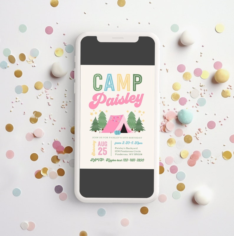 May include: A smartphone displays a colorful invitation for a camp-themed birthday party. The invitation features the text "CAMP Paisley" above a pink tent illustration, with details including the date, time, and RSVP information. Confetti in various colors surrounds the phone.