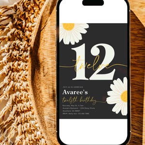 May include: A black and white birthday invitation on a smartphone screen. The invitation features a large yellow number 12 with the word "twelve" written in cursive. The background is black with white daisies. The text reads "Join us to celebrate Avaree's twelfth birthday. Saturday, May 22, 4-7pm. Avaree's Backyard - 1234 Daisy Circle. Anywhere, CA 98007. RSVP: Molly text 123-456-7890."