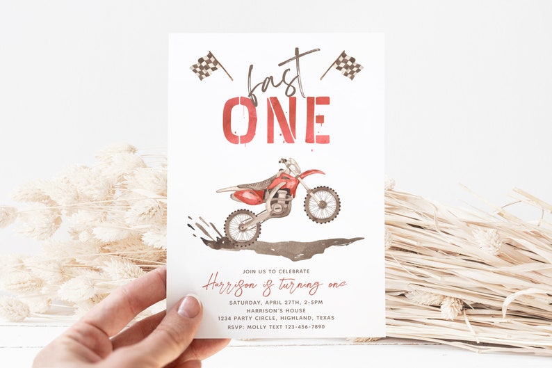 May include: A red and white motocross birthday party invitation with a red dirt bike jumping over a puddle of mud. The invitation says "Fast One" and includes the text "Join us to celebrate Harrison is turning one".