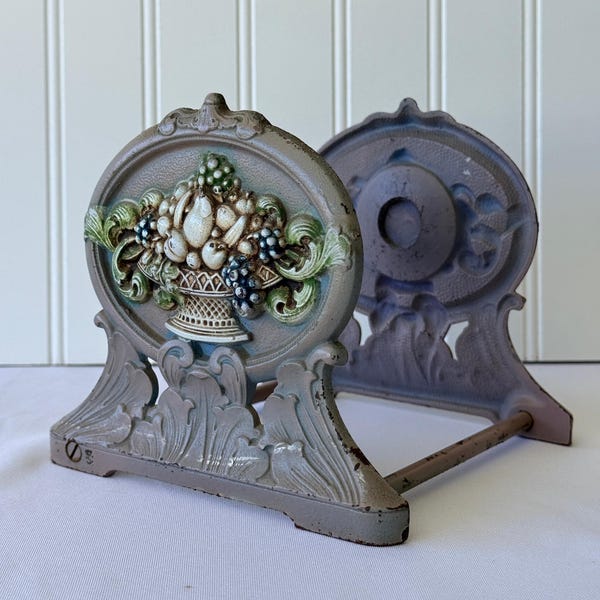 Judd style floral basket cast iron decorative bookends
