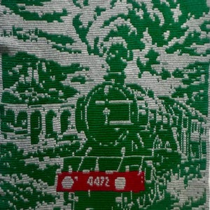 May include: A white ceramic mug with a black handle and the text "But First, Coffee" in a black, bold font. The mug is sitting on a white surface. The mug appears to be 12 ounces.