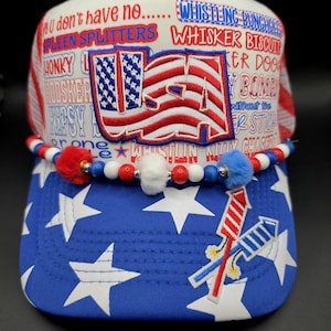 May include: A handmade wooden sign with the text "Welcome" in a playful font. The sign features a distressed white background and a dark stained wooden frame. A small, decorative heart is attached to the sign.