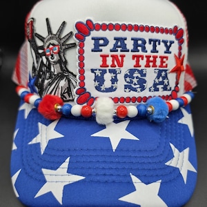 May include: A rustic wooden sign with the text "Welcome to our home" in white lettering. The sign features a distressed finish and a simple, inviting design, perfect for a front porch or entryway.