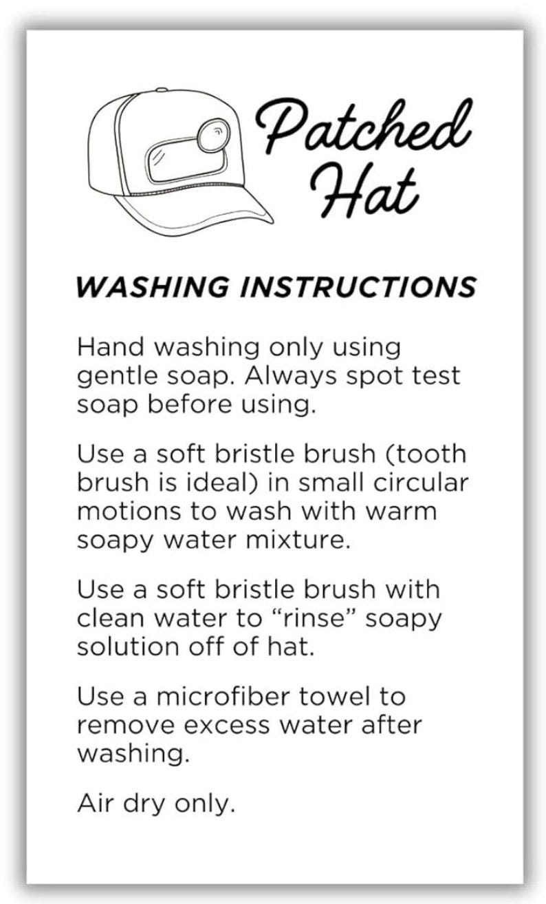 May include: A black and white illustration of a baseball cap with the text "Patched Hat". Below the illustration are washing instructions: hand wash with gentle soap, use a soft brush, rinse with clean water, and air dry.