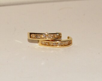 14K Yellow Gold Earrings 8 Genuine Round Diamond On Each.