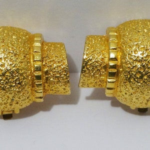 YSL Unique Gold Tone Clip-On Earrings.
