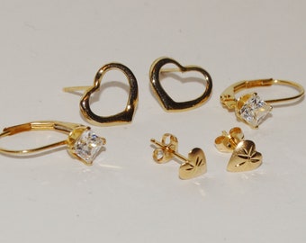 14k Yellow Gold Stamped Three Pairs Of Small Earrings.