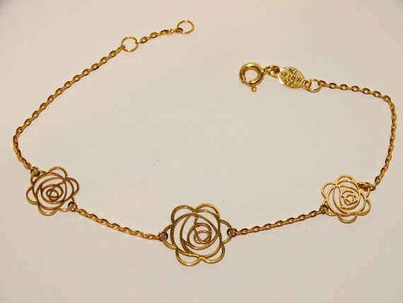 750k or 18k Gold cut-out Rose Design Bracelet. - image 8