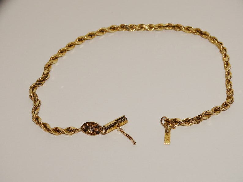 14k 5.7 Grams Solid Yellow Gold Designer Signed Rope Bracelet w/Genuine Diamond. image 2