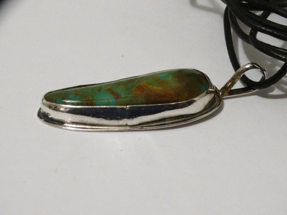Navajo Sterling Silver RV Signed Turquoise on Adjustable Leather Cord.