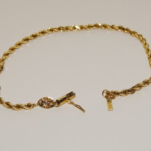 14k 5.7 Grams Solid Yellow Gold Designer Signed Rope Bracelet w/Genuine Diamond. image 4