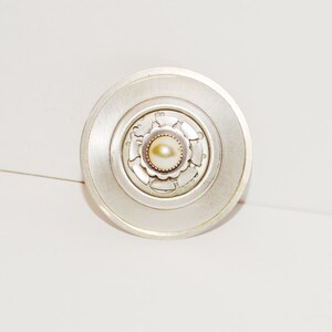 Silver Tone Custom 15 gram, 1.5&quot; diameter Brooch.