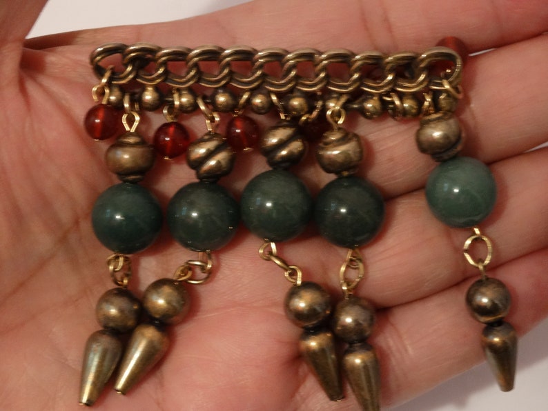 Large Brass With Dangling Geen Jade Bead Brooch.