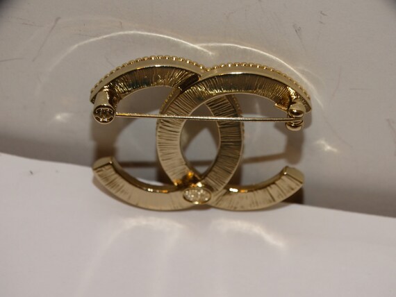 Chanel rhinestone brooch online
