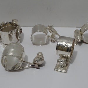 1900s versilberte figurale Serviettenhalter. 5er Set