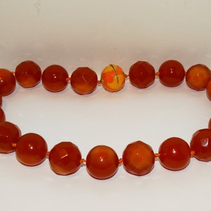 Plastic Orange Necklace.